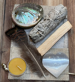 Sage Wands and Palo Santo Sticks smudging